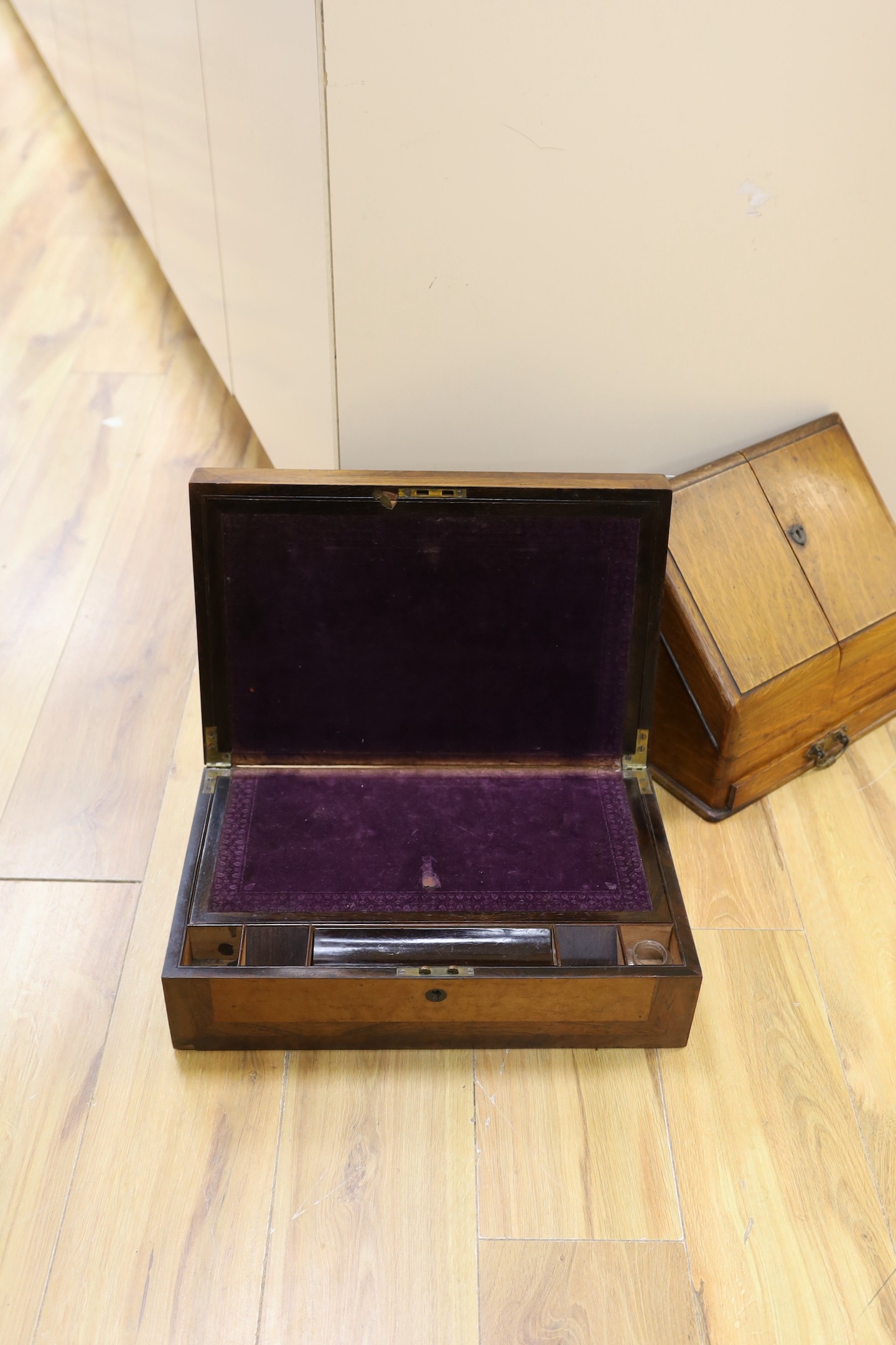 A Victorian birds eye maple and rosewood writing slope, 44.5 cms wide x 14 cms high.